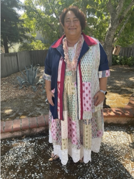 Joy wearing her Kantha quilt dress and embellished jacket