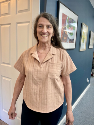 Vicki E. wearing her striped cotton shirt