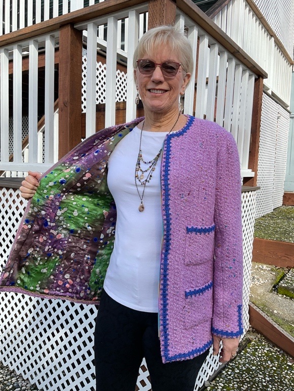 Cathy Tonne’s French couture jacket open to show the printed silk lining