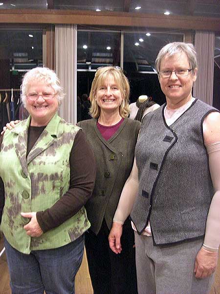 Three ladies in vests